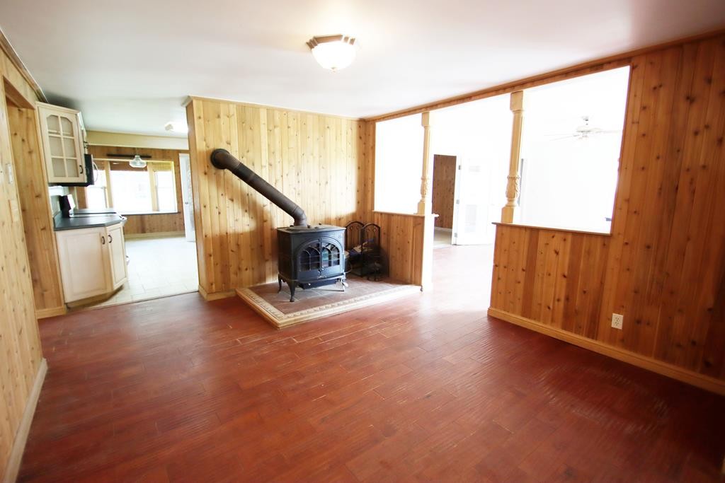 777 Lovejoy Road Sparta, TN 38583 - Photo 8 of 47 a living room with furniture and a wooden floor