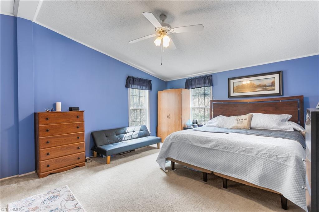 8734 Fulp Road Stokesdale, NC 27357 - Photo 17 of 28 Primary bedroom