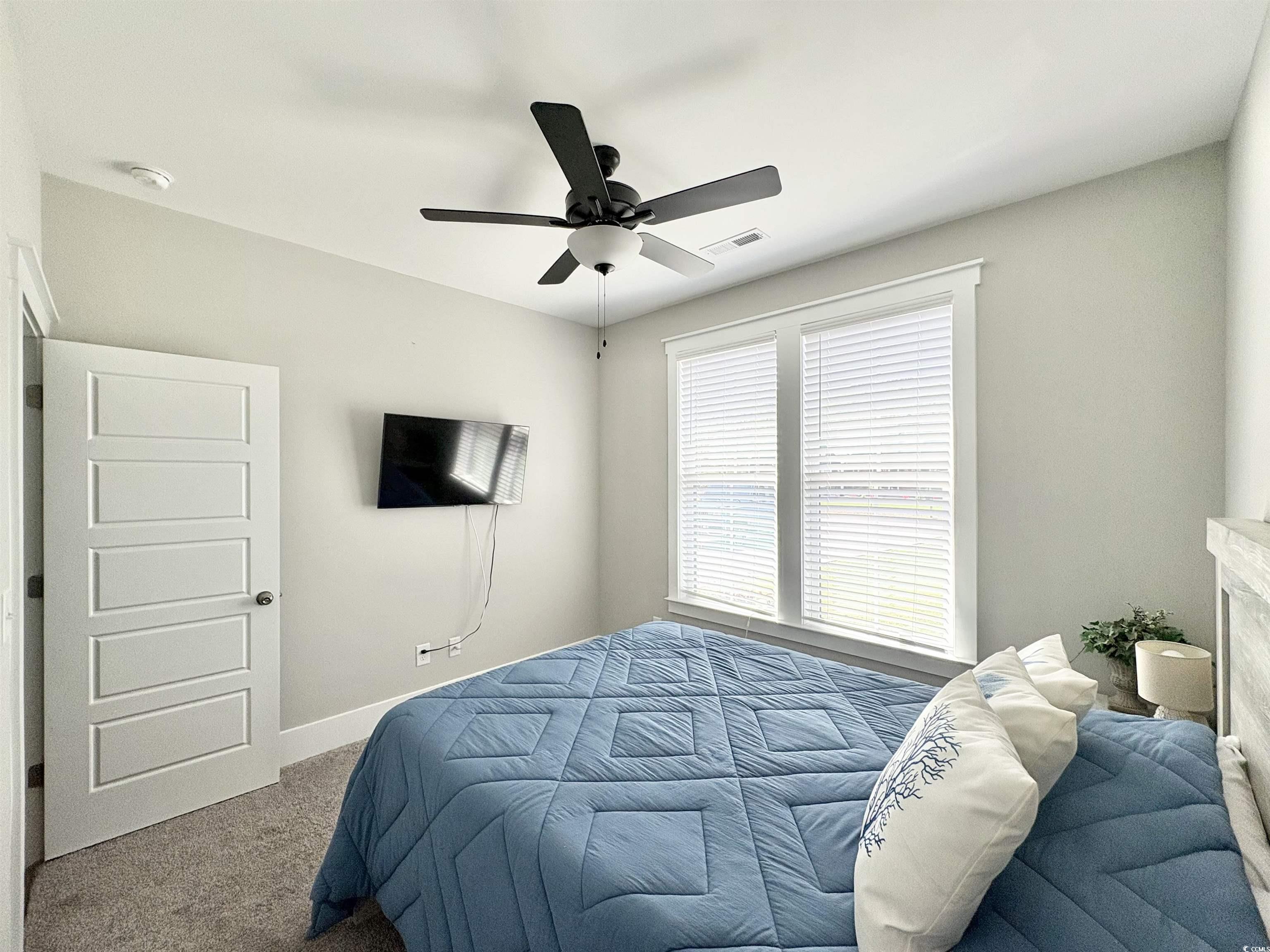 11124 Lee Circle Murrells Inlet, SC 29576 - Photo 22 of 25 Bedroom with visible vents, baseboards, a ceiling
