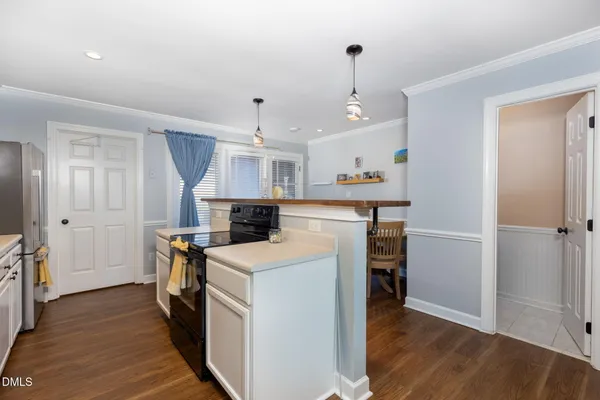 a view of a kitchen and utility room