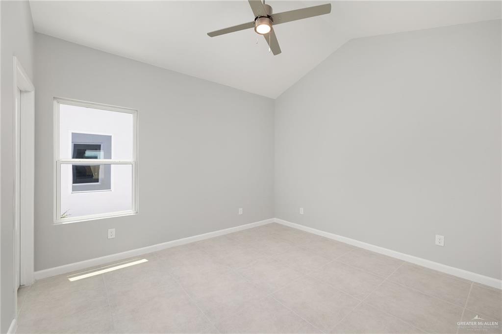 2701 Robin Road Weslaco, TX 78596 - Photo 13 of 30 an empty room with a window