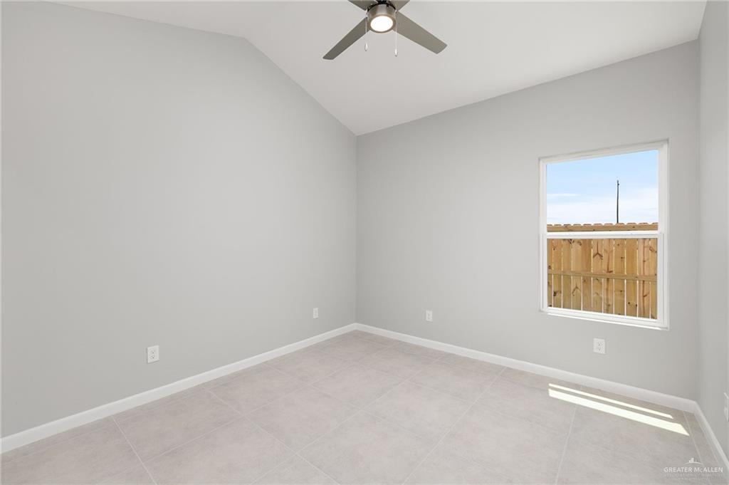 2701 Robin Road Weslaco, TX 78596 - Photo 22 of 30 an empty room with a window