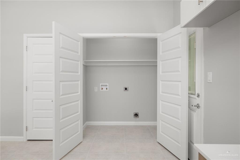 2701 Robin Road Weslaco, TX 78596 - Photo 9 of 30 a view of an empty walk in closet