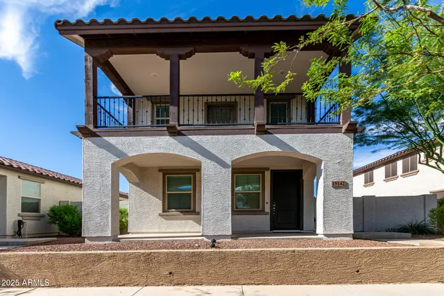 a view of a house with a street