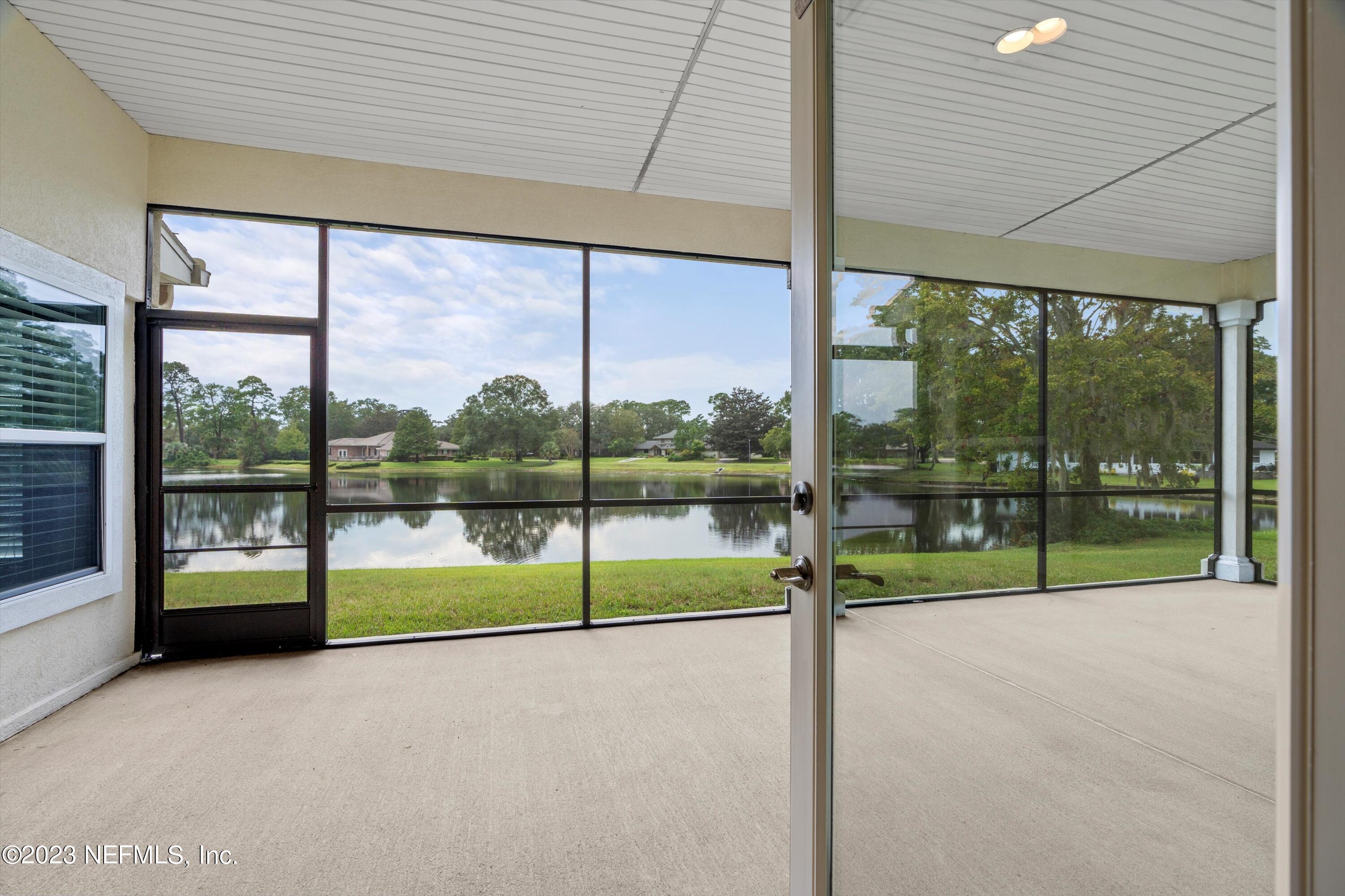7936 Pine Lake Road Jacksonville, FL 32256 - Photo 23 of 52 a view of an empty room with window