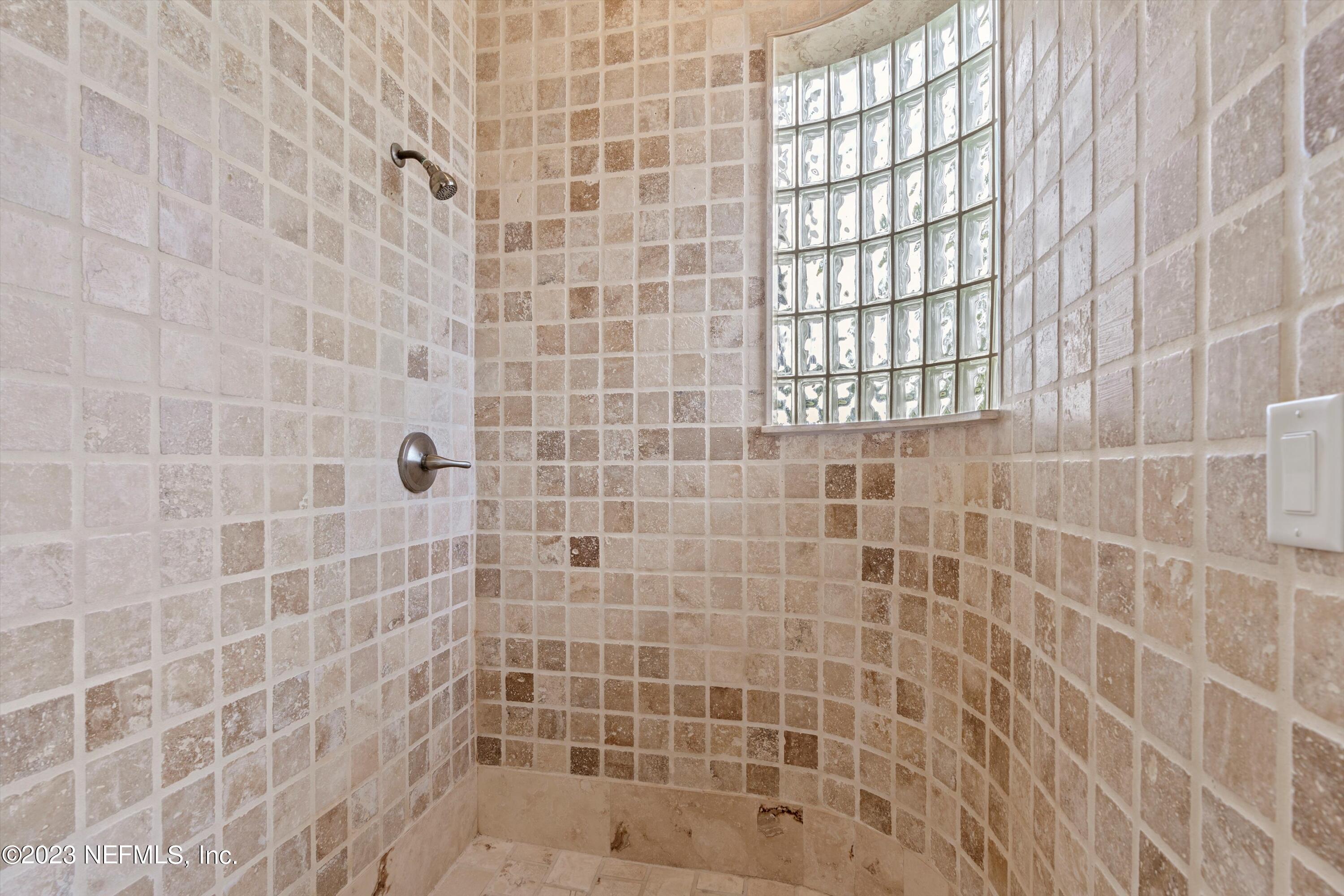 7936 Pine Lake Road Jacksonville, FL 32256 - Photo 25 of 52 a bathroom with a shower
