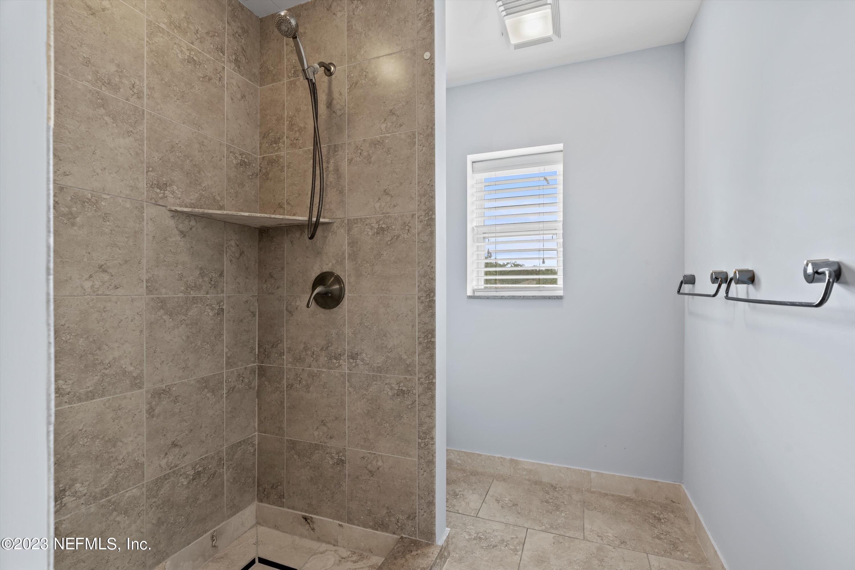 7936 Pine Lake Road Jacksonville, FL 32256 - Photo 28 of 52 a bathroom with a shower