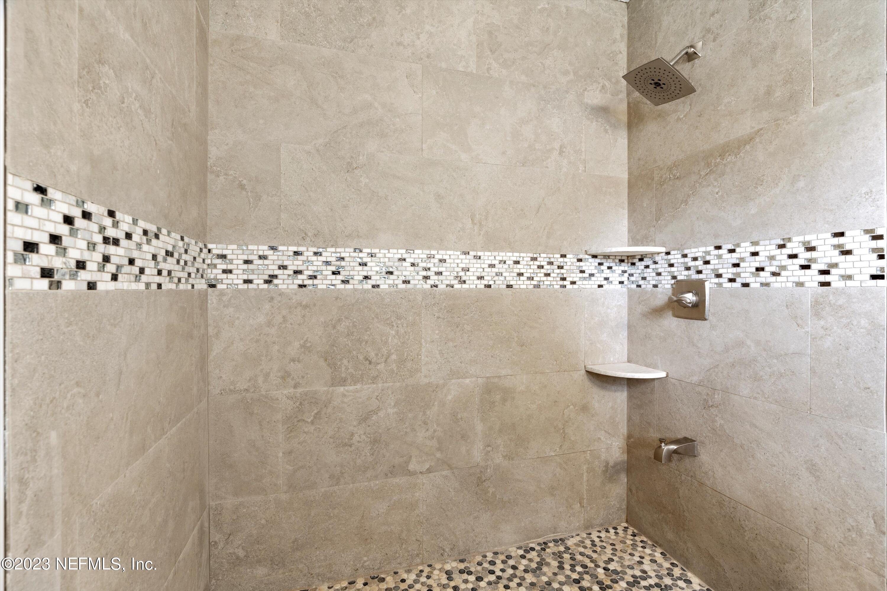 7936 Pine Lake Road Jacksonville, FL 32256 - Photo 36 of 52 a bathroom with a shower