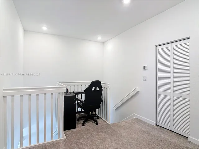 a room with a bed and a window