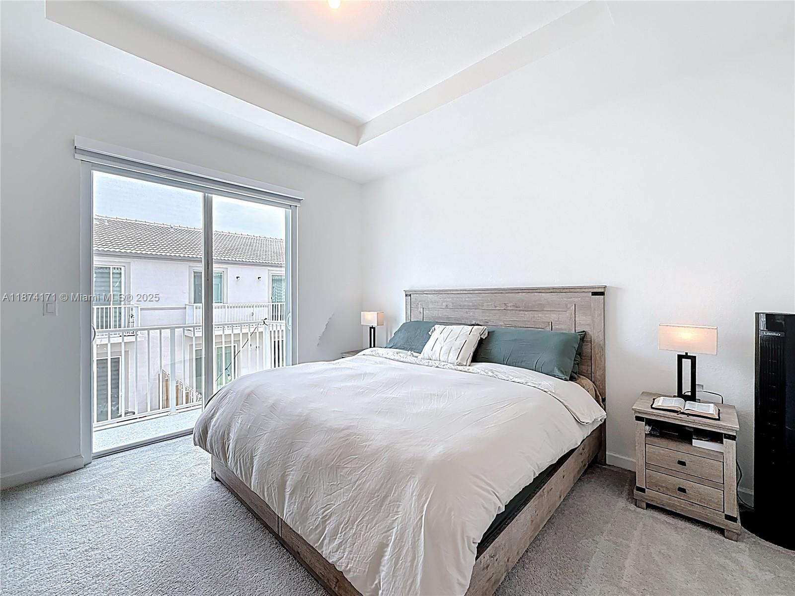 716 Southeast 14th Street Homestead, FL 33034 - Photo 38 of 60 a bedroom with a bed and a window