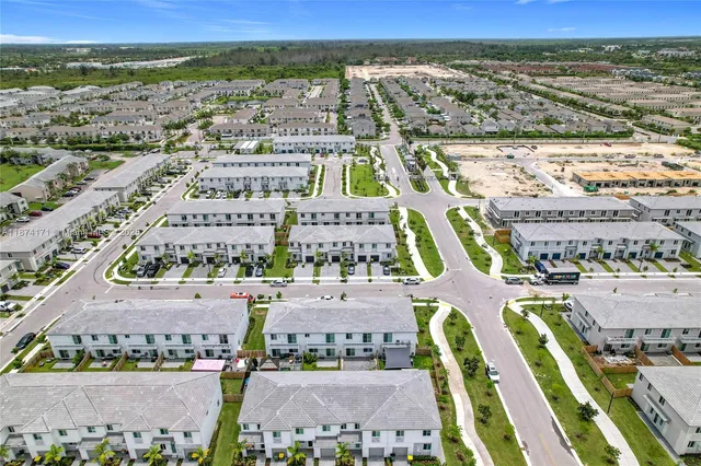 a view of city with ocean