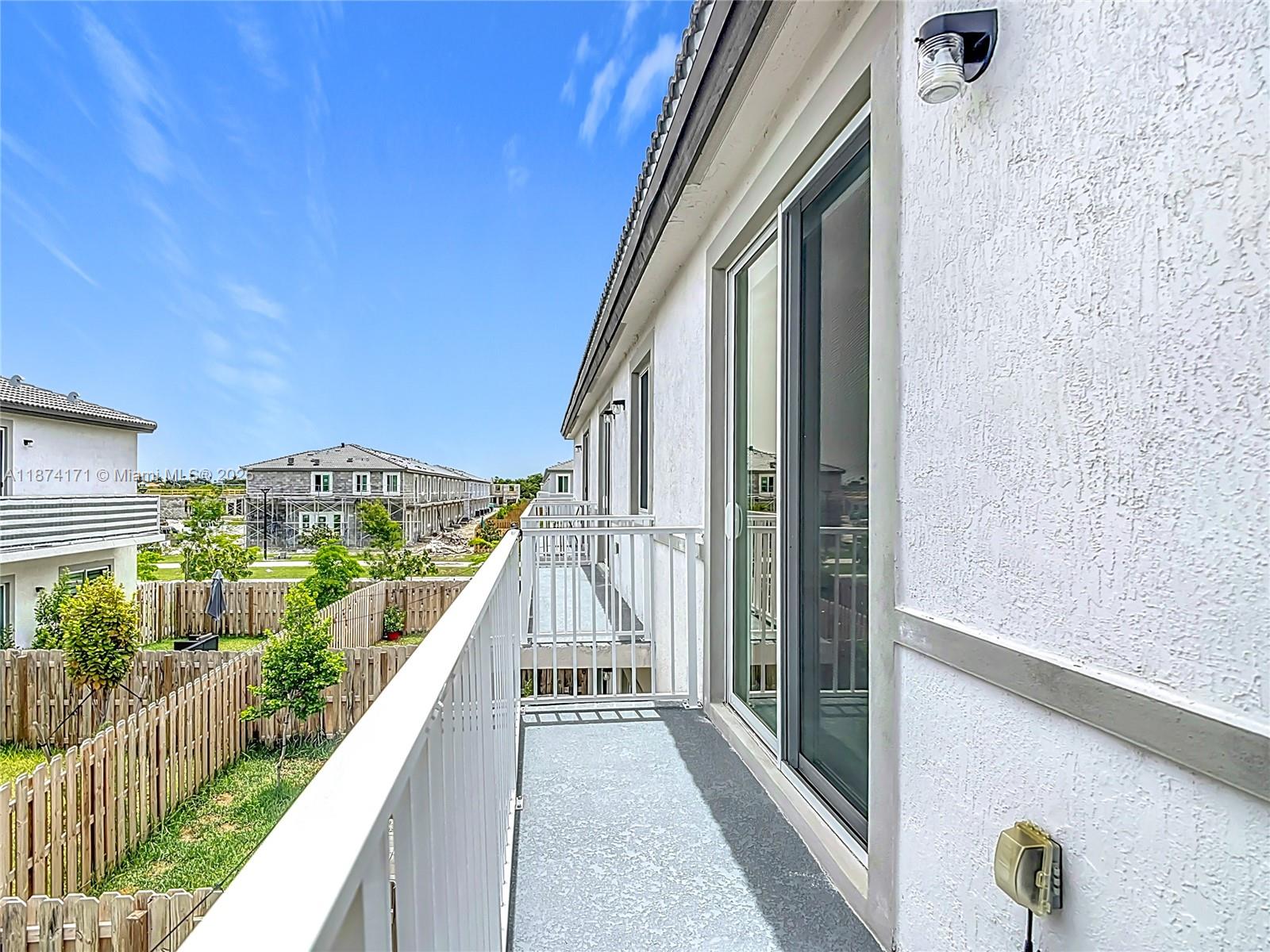 716 Southeast 14th Street Homestead, FL 33034 - Photo 47 of 60 a view of a balcony with city view