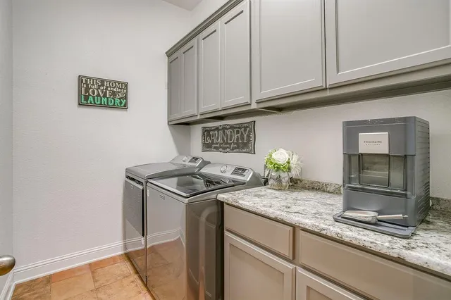 a kitchen with granite countertop a sink and a stove