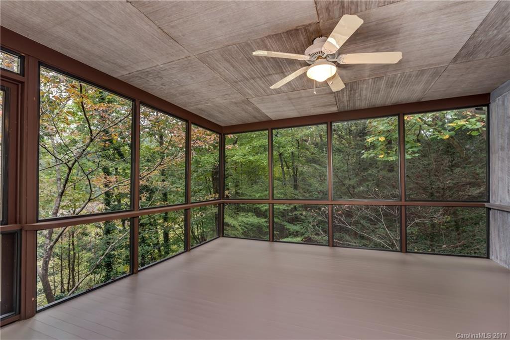 81 Jericho Drive Tryon, NC 28782 - Photo 11 of 23 wooden floor in an empty room with a window