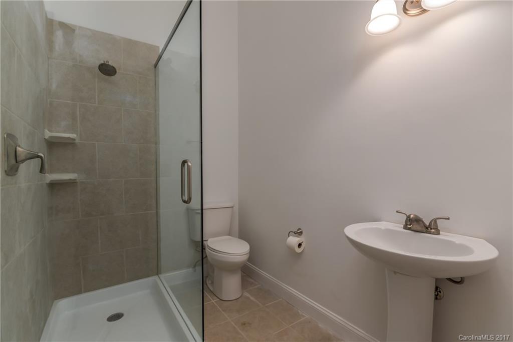 81 Jericho Drive Tryon, NC 28782 - Photo 19 of 23 a bathroom with a sink toilet and shower