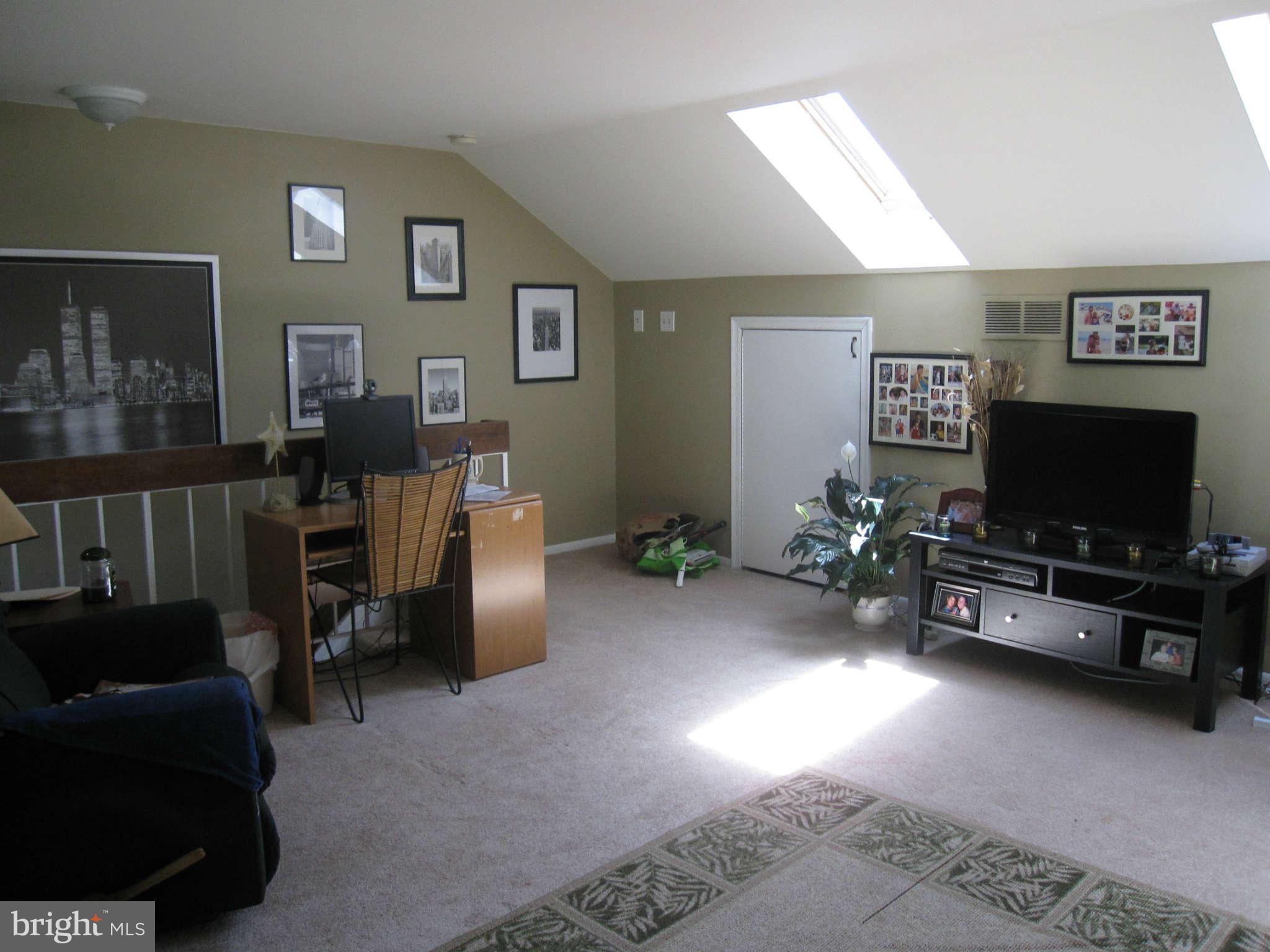 89 Valley Ridge Loop Cockeysville, MD 21030 - Photo 8 of 16 a living room with furniture and a flat screen tv