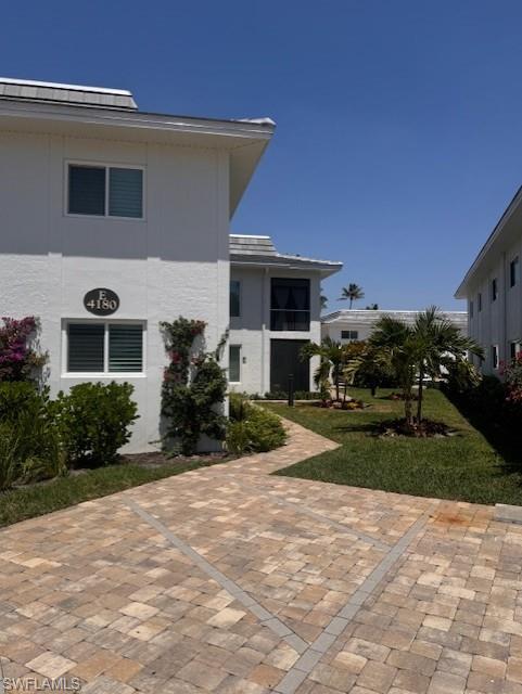 4180 Crayton Road, Unit E4 Naples, FL 34103 - Photo 22 of 25 Front of Building