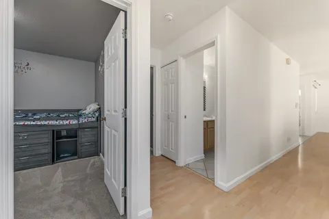 a view of a kitchen from the hallway