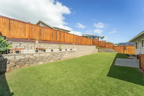 a view of a back yard of the house