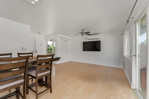 a view of a livingroom with furniture and wooden floor
