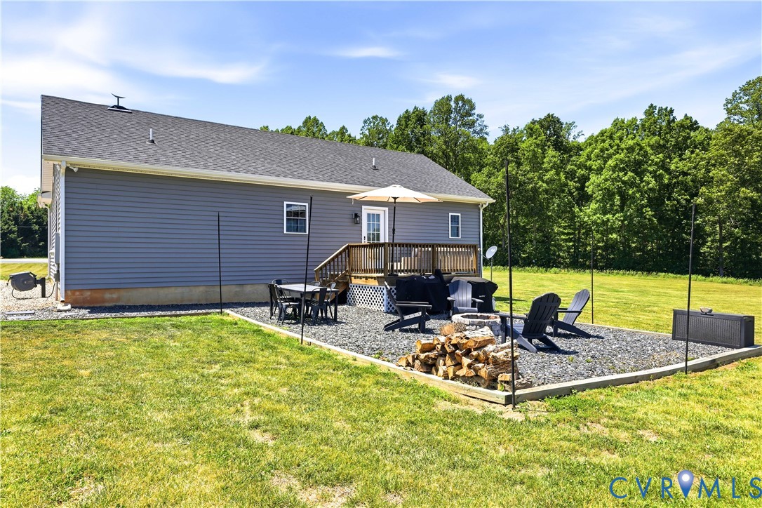 235 Stoney Point Road Cumberland, VA 23040 - Photo 11 of 35 a view of a house with backyard and sitting area