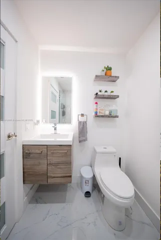 a bathroom with a tub and a shower