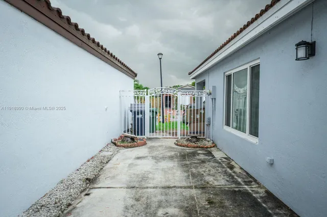 a view of outdoor space with wooden fence