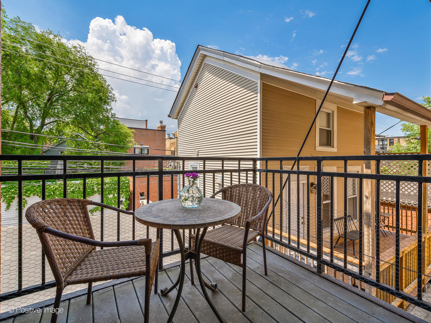 2030 North Halsted Street, Unit 2N Chicago, IL 60614 - Photo 25 of 26 a view of a balcony with table and chairs