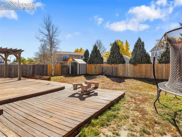 a view of a terrace with chairs