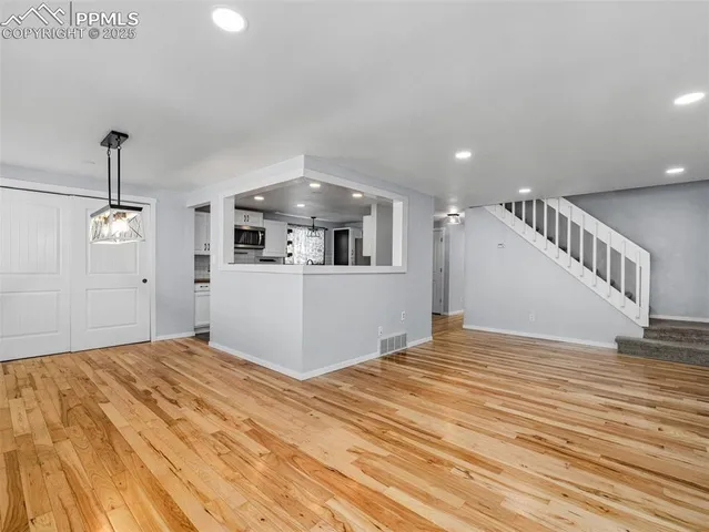 a view of a livingroom with a furniture
