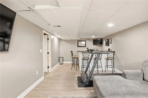 a view of a livingroom with wooden floor