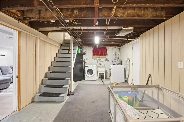 a view of a kitchen with a sink and a dishwasher