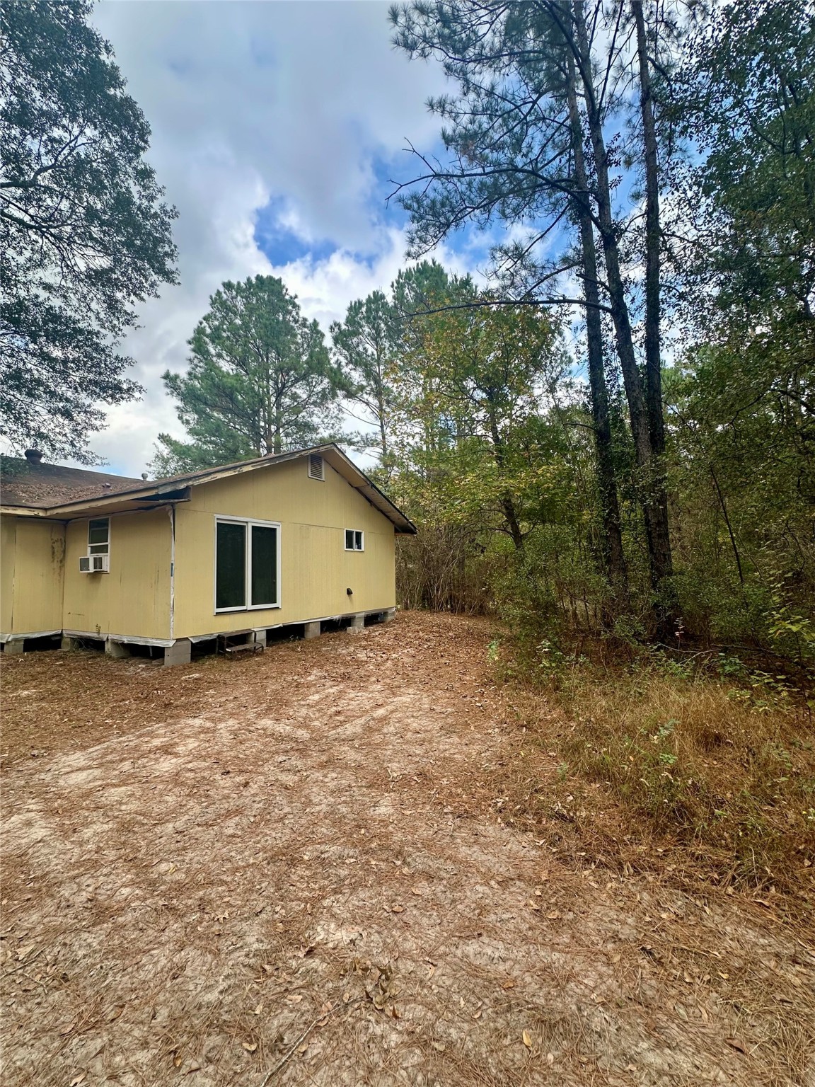 11140 FM 1484 Road Conroe, TX 77303 - Photo 31 of 43 a view of a house with a yard