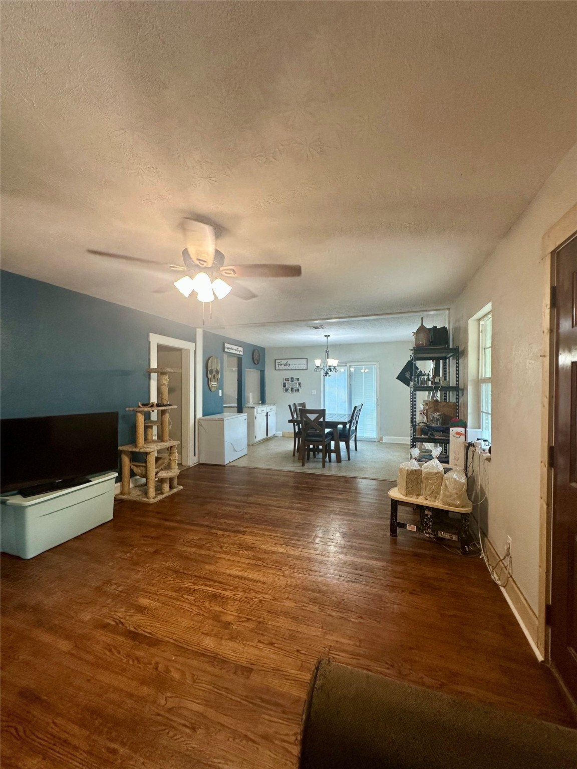 11140 FM 1484 Road Conroe, TX 77303 - Photo 36 of 43 a living room with furniture and a flat screen tv