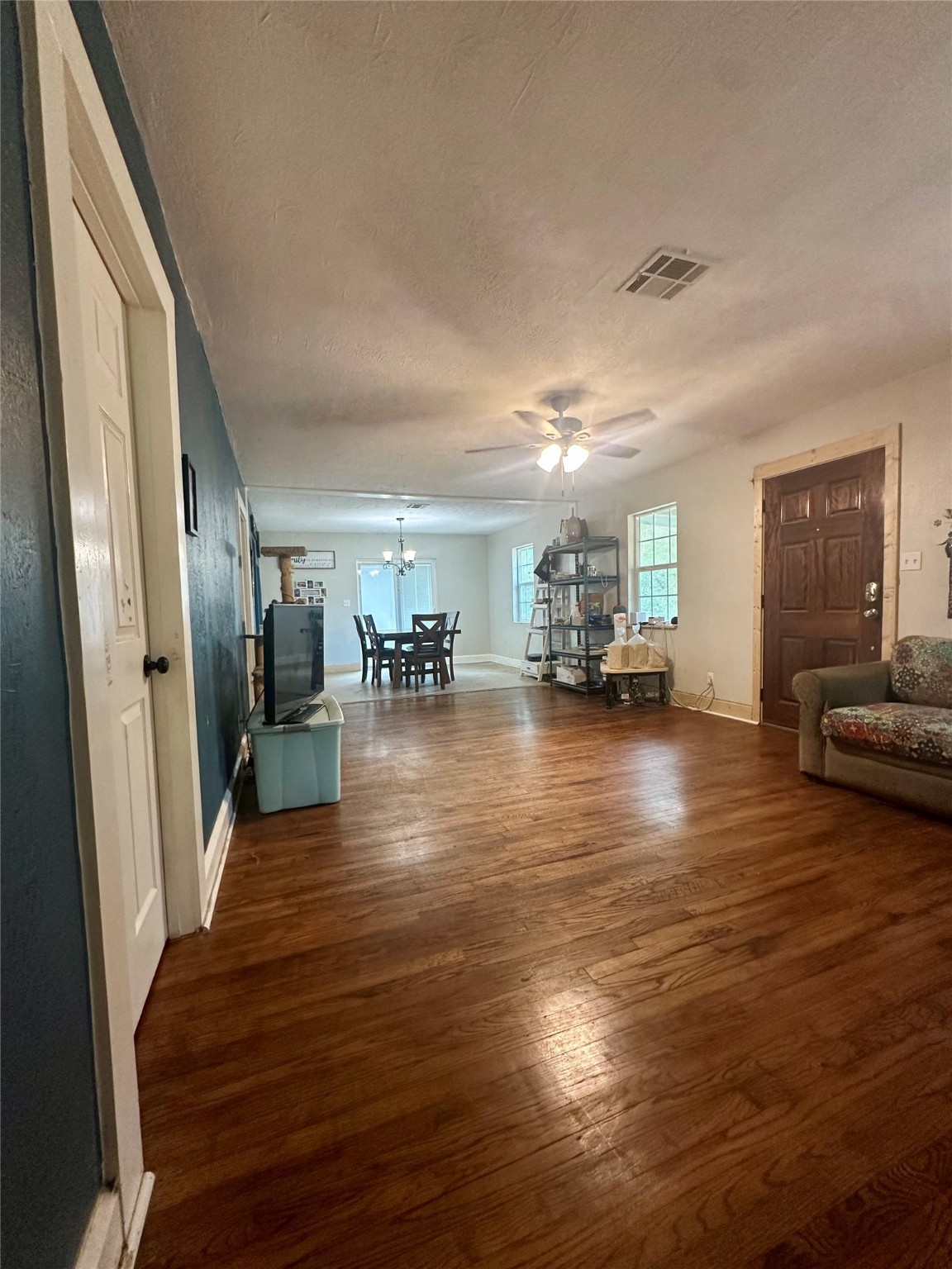 11140 FM 1484 Road Conroe, TX 77303 - Photo 37 of 43 a view of a living room and kitchen with furniture