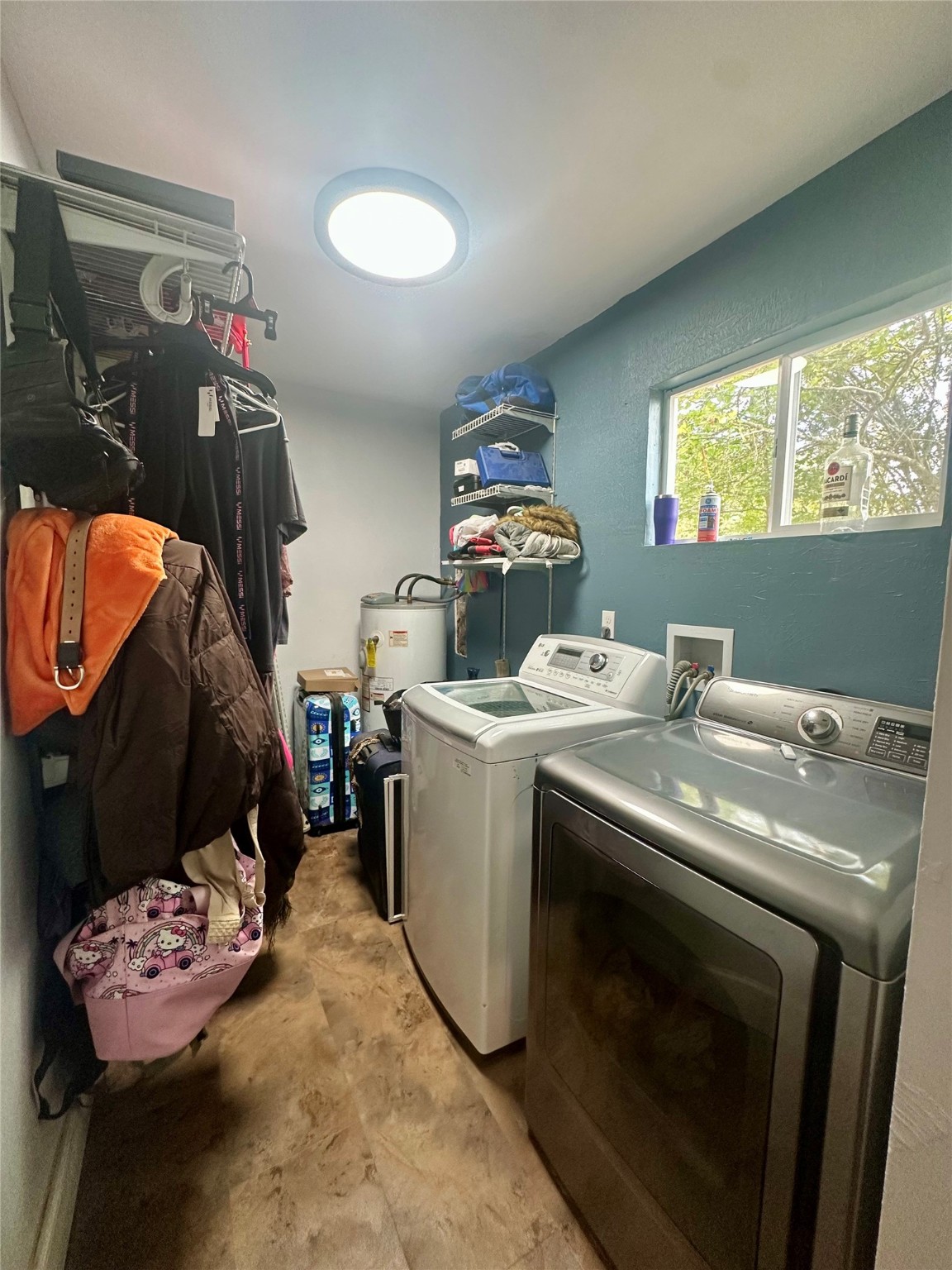 11140 FM 1484 Road Conroe, TX 77303 - Photo 41 of 43 a utility room with sink dryer and washer