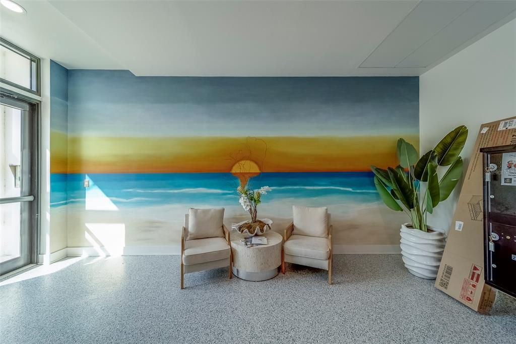 400 150th Avenue, Unit 407 Madeira Beach, FL 33708 - Photo 3 of 59 a dining room with furniture and a potted plant