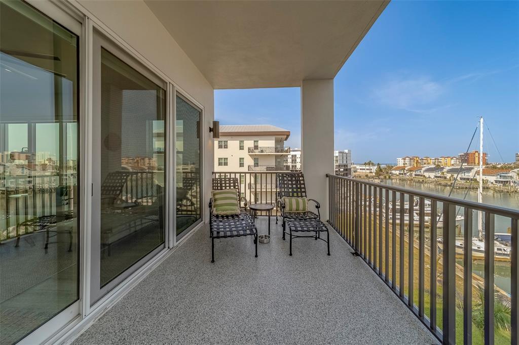 400 150th Avenue, Unit 407 Madeira Beach, FL 33708 - Photo 37 of 59 a view of a balcony with chair