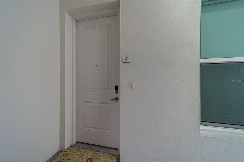 400 150th Avenue, Unit 407 Madeira Beach, FL 33708 - Photo 4 of 59 a view of an empty room