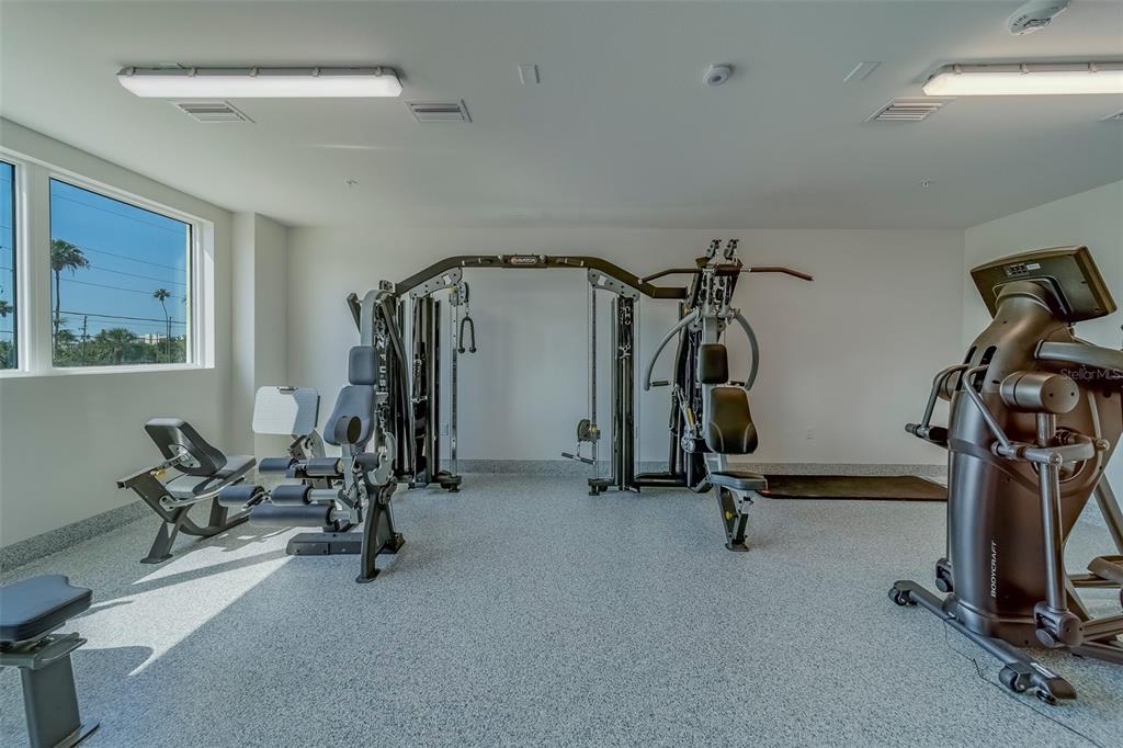 400 150th Avenue, Unit 407 Madeira Beach, FL 33708 - Photo 43 of 59 a view of a room with gym equipment