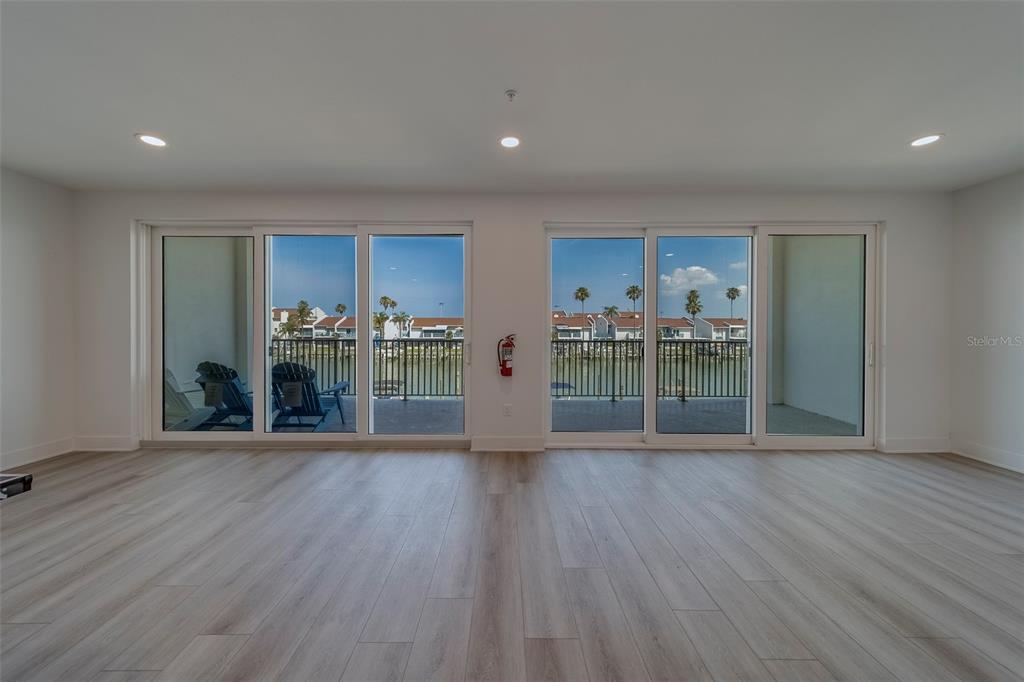 400 150th Avenue, Unit 407 Madeira Beach, FL 33708 - Photo 49 of 59 a view of kitchen and wooden floor
