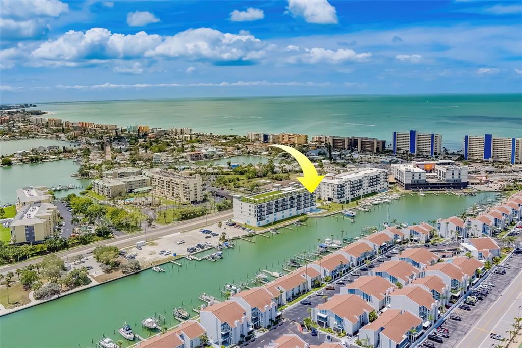 400 150th Avenue, Unit 407 Madeira Beach, FL 33708 - Photo 59 of 59 a view of a city with an ocean