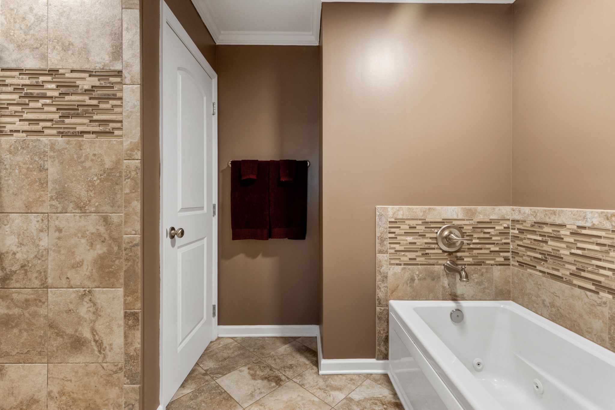 308 Turning Leaf Trail Cleveland, TN 37312 - Photo 25 of 49 a bathroom with a bathtub and shower
