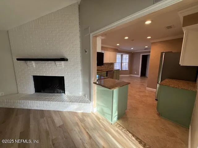 a view of a kitchen with kitchen and a sink