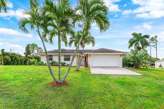 a view of a backyard with a garden