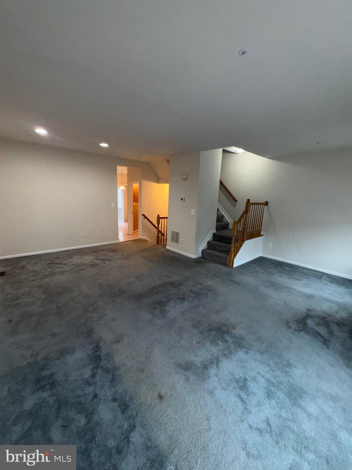 7705 Periwinkle Way, Unit 71 Severn, MD 21144 - Photo 11 of 28 a view of an empty room