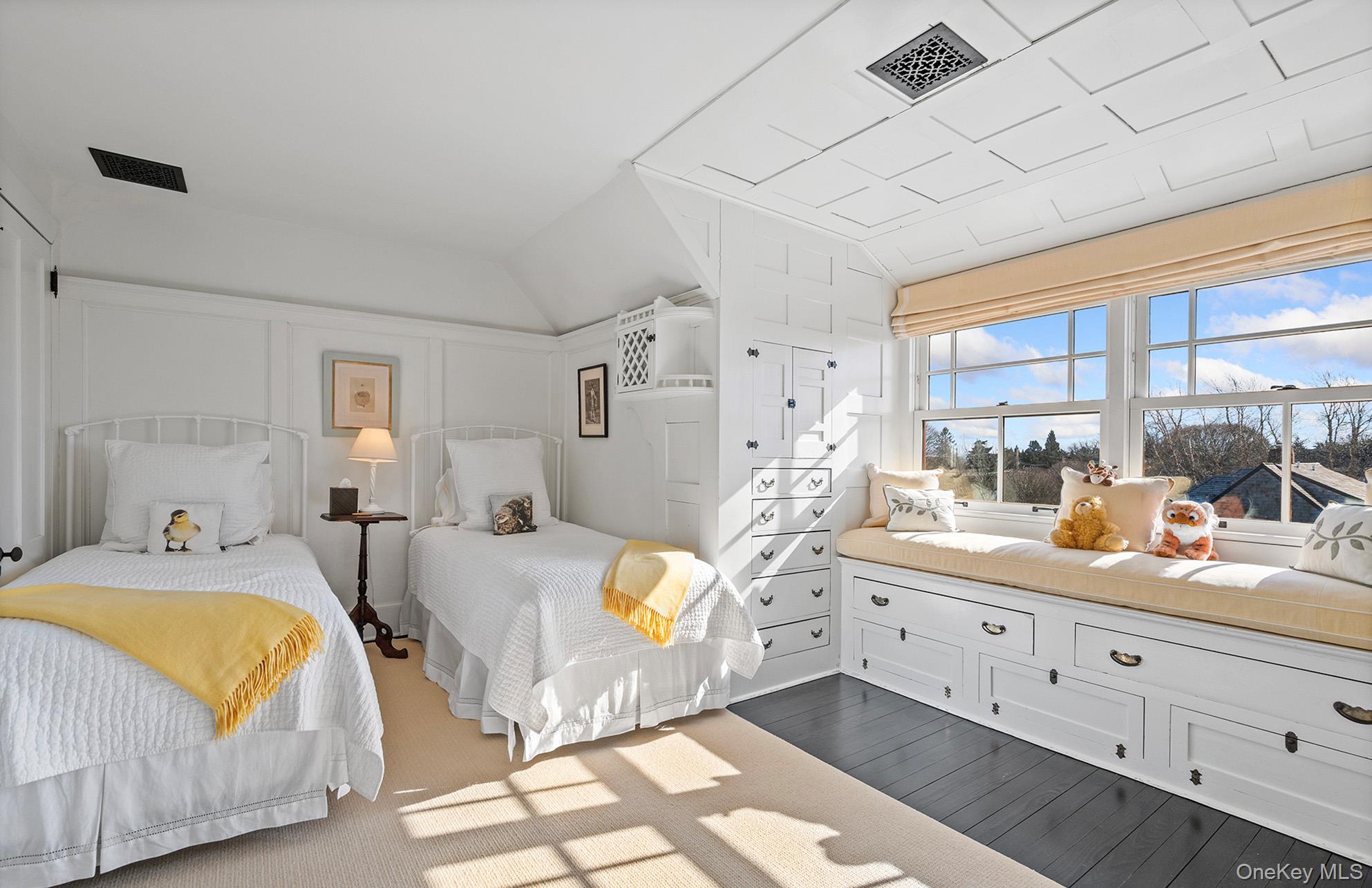 322 Rose Hill Road Water Mill, NY 11976 - Photo 11 of 33 a bedroom with double bed and a window