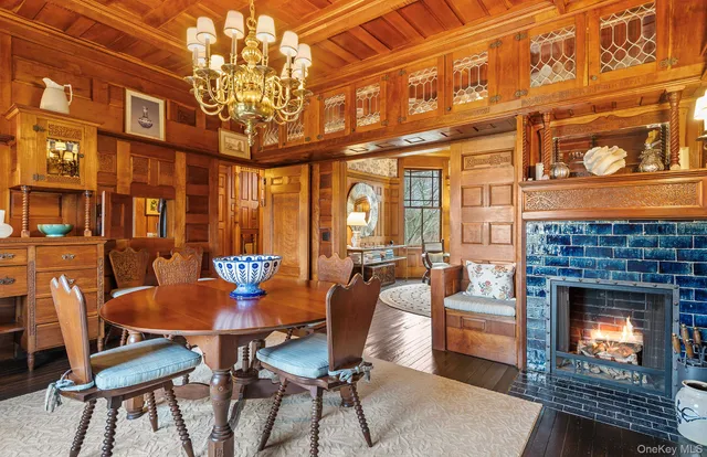 a bathroom with a granite countertop sink and washing machine