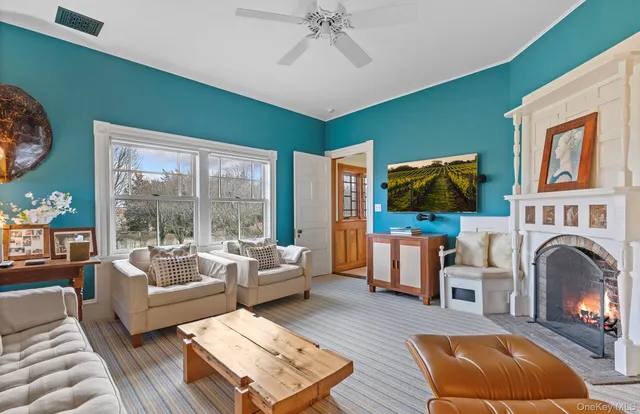 a kitchen with a stove cabinets and wooden floor