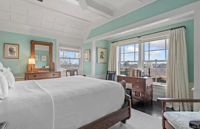 a living room with a couch and a table